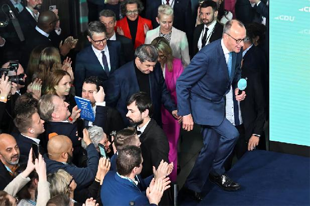 Friedrich Merz en Markus Soeder na de bekendmaking van de exitpollresultaten