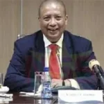 Governor Maurice Roemer bespreekt de noodzaak van een nieuw IMF-programma om de Surinaamse economie te stabiliseren na de beëindiging van het herstelprogramma.