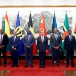 Afbeelding: Minister Stanley Raghoebarsing van Financiën tijdens het China-CELAC-forum.